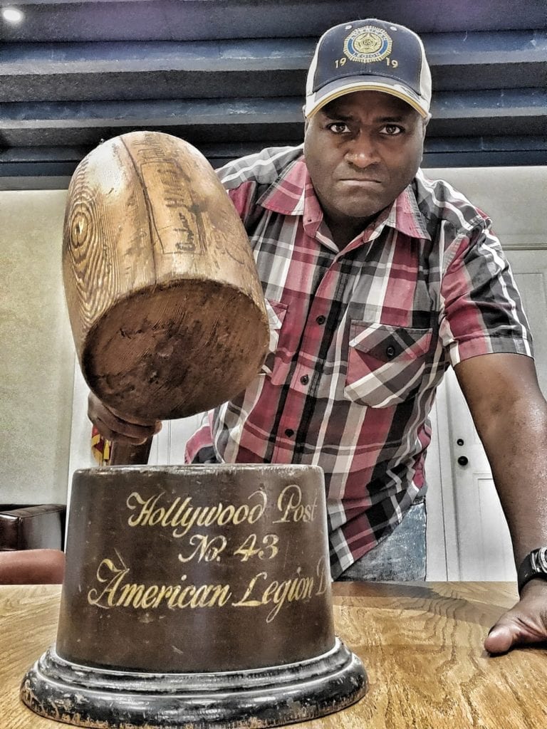 American Legion Hollywood Post 43's Jeff Daly wields a rather large gavel. 